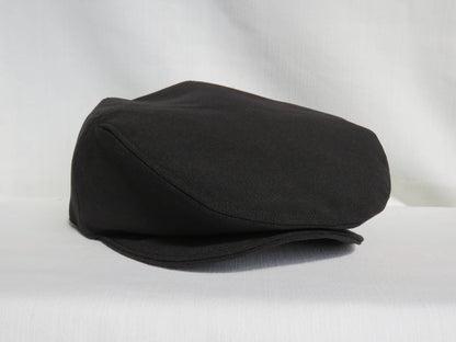 black newsboy hat